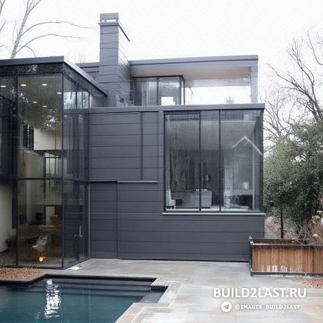 Вид на стеклянный дом с улицы, яркий солнечный день, отражение неба в стеклянных стенах